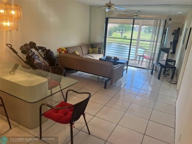 WOW!!! GORGEOUS 2 BEDROOM 2 BATHROOM CONDO (55+ COMMUNITY) ON on Sunrise Lakes Phase IV Golf Course in Florida - for sale on GolfHomes.com, golf home, golf lot