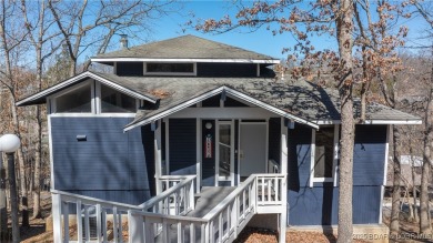 Welcome to Tan Tar A Estates! This 3 bedroom, 4 bathroom home is on The Oaks Golf Course in Missouri - for sale on GolfHomes.com, golf home, golf lot