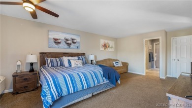 Welcome to Tan Tar A Estates! This 3 bedroom, 4 bathroom home is on The Oaks Golf Course in Missouri - for sale on GolfHomes.com, golf home, golf lot