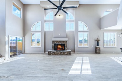 Experience luxury living in this beautiful 3-bedroom, 3-bathroom on London Bridge Golf Course in Arizona - for sale on GolfHomes.com, golf home, golf lot