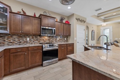 Welcome HOME! This meticulously maintained Sanibel II model by on Rotonda Golf and Country Club The Links Course in Florida - for sale on GolfHomes.com, golf home, golf lot