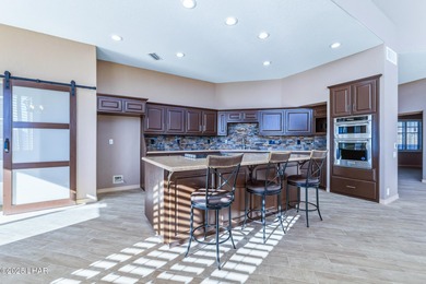 Experience luxury living in this beautiful 3-bedroom, 3-bathroom on London Bridge Golf Course in Arizona - for sale on GolfHomes.com, golf home, golf lot