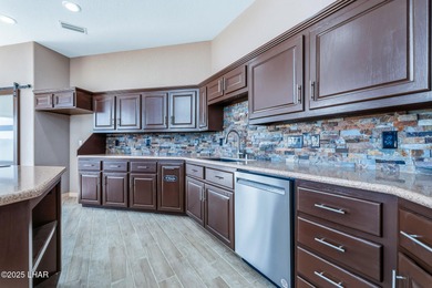 Experience luxury living in this beautiful 3-bedroom, 3-bathroom on London Bridge Golf Course in Arizona - for sale on GolfHomes.com, golf home, golf lot