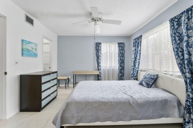 Welcome to this well-maintained 2-bedroom, 2-bathroom condo with on Indian Spring Golf and Country Club in Florida - for sale on GolfHomes.com, golf home, golf lot