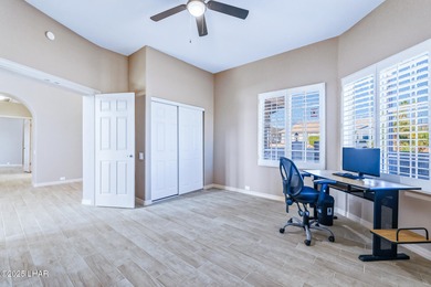 Experience luxury living in this beautiful 3-bedroom, 3-bathroom on London Bridge Golf Course in Arizona - for sale on GolfHomes.com, golf home, golf lot