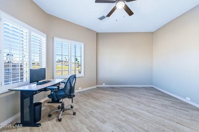 Experience luxury living in this beautiful 3-bedroom, 3-bathroom on London Bridge Golf Course in Arizona - for sale on GolfHomes.com, golf home, golf lot