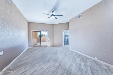 Experience luxury living in this beautiful 3-bedroom, 3-bathroom on London Bridge Golf Course in Arizona - for sale on GolfHomes.com, golf home, golf lot