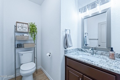 Experience luxury living in this beautiful 3-bedroom, 3-bathroom on London Bridge Golf Course in Arizona - for sale on GolfHomes.com, golf home, golf lot