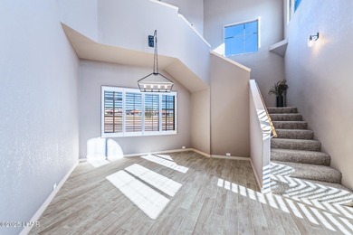 Experience luxury living in this beautiful 3-bedroom, 3-bathroom on London Bridge Golf Course in Arizona - for sale on GolfHomes.com, golf home, golf lot