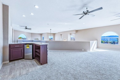 Experience luxury living in this beautiful 3-bedroom, 3-bathroom on London Bridge Golf Course in Arizona - for sale on GolfHomes.com, golf home, golf lot
