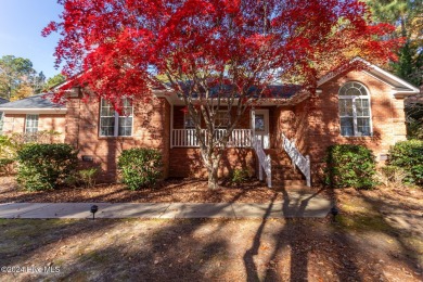 This charming ranch-style, brick home is located on a quiet on Beacon Ridge Golf and Country Club in North Carolina - for sale on GolfHomes.com, golf home, golf lot