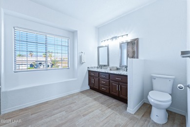 Experience luxury living in this beautiful 3-bedroom, 3-bathroom on London Bridge Golf Course in Arizona - for sale on GolfHomes.com, golf home, golf lot