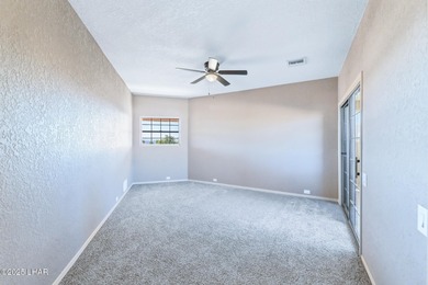 Experience luxury living in this beautiful 3-bedroom, 3-bathroom on London Bridge Golf Course in Arizona - for sale on GolfHomes.com, golf home, golf lot