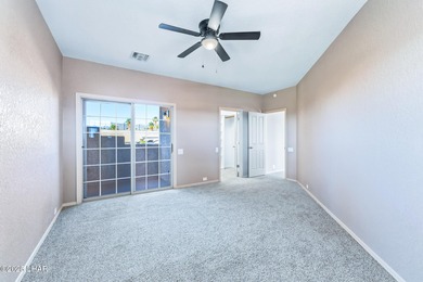 Experience luxury living in this beautiful 3-bedroom, 3-bathroom on London Bridge Golf Course in Arizona - for sale on GolfHomes.com, golf home, golf lot