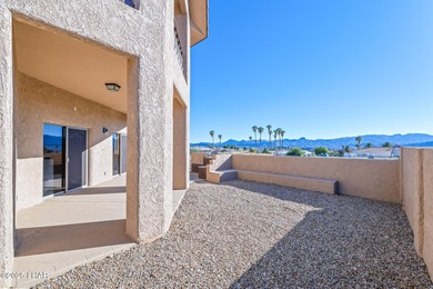 Experience luxury living in this beautiful 3-bedroom, 3-bathroom on London Bridge Golf Course in Arizona - for sale on GolfHomes.com, golf home, golf lot