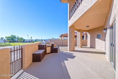 Experience luxury living in this beautiful 3-bedroom, 3-bathroom on London Bridge Golf Course in Arizona - for sale on GolfHomes.com, golf home, golf lot