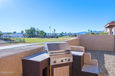 Experience luxury living in this beautiful 3-bedroom, 3-bathroom on London Bridge Golf Course in Arizona - for sale on GolfHomes.com, golf home, golf lot