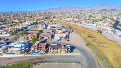 Experience luxury living in this beautiful 3-bedroom, 3-bathroom on London Bridge Golf Course in Arizona - for sale on GolfHomes.com, golf home, golf lot