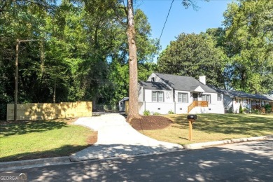 Large and updated: two words that best describe this gorgeous on Browns Mill Golf Course in Georgia - for sale on GolfHomes.com, golf home, golf lot