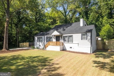 Large and updated: two words that best describe this gorgeous on Browns Mill Golf Course in Georgia - for sale on GolfHomes.com, golf home, golf lot