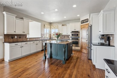 This exceptional 6 bedroom, 5 bathroom residence offers the on The Club At Flying Horse in Colorado - for sale on GolfHomes.com, golf home, golf lot
