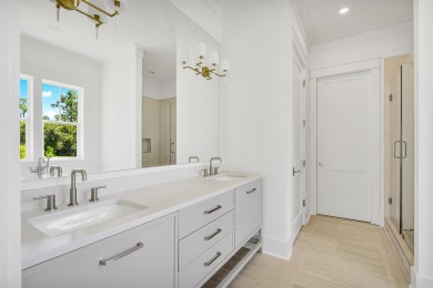 Experience elevated coastal living in the Suffolk II by Romair on Origins Golf Club in Florida - for sale on GolfHomes.com, golf home, golf lot