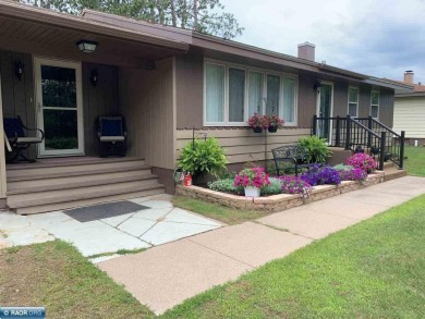 Beautiful home nestled on just over half an acre.  One level on Eveleth Municipal Golf Course in Minnesota - for sale on GolfHomes.com, golf home, golf lot