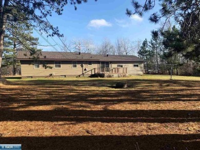 Beautiful home nestled on just over half an acre.  One level on Eveleth Municipal Golf Course in Minnesota - for sale on GolfHomes.com, golf home, golf lot