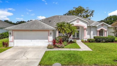 Make this home your own Florida Paradise - Enjoy, a HEATED on Meadow Oaks Golf and Country Club in Florida - for sale on GolfHomes.com, golf home, golf lot
