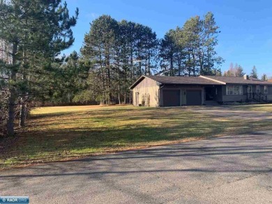 Beautiful home nestled on just over half an acre.  One level on Eveleth Municipal Golf Course in Minnesota - for sale on GolfHomes.com, golf home, golf lot