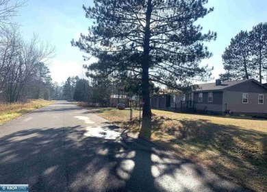 Beautiful home nestled on just over half an acre.  One level on Eveleth Municipal Golf Course in Minnesota - for sale on GolfHomes.com, golf home, golf lot