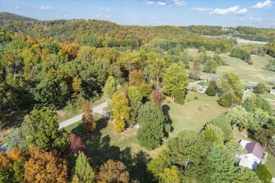 The essence of Tennessee Living! Honest Abe Log Home perched on on Hidden Valley Golf and Country Club in Tennessee - for sale on GolfHomes.com, golf home, golf lot