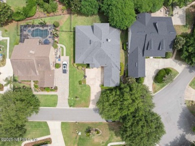Welcome to this absolutely stunning, model-quality David Weekley on St. Johns Golf and Country Club in Florida - for sale on GolfHomes.com, golf home, golf lot
