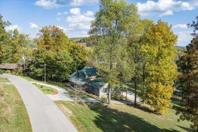 The essence of Tennessee Living! Honest Abe Log Home perched on on Hidden Valley Golf and Country Club in Tennessee - for sale on GolfHomes.com, golf home, golf lot