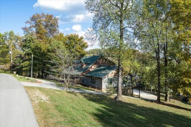 The essence of Tennessee Living! Honest Abe Log Home perched on on Hidden Valley Golf and Country Club in Tennessee - for sale on GolfHomes.com, golf home, golf lot