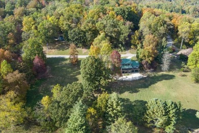 The essence of Tennessee Living! Honest Abe Log Home perched on on Hidden Valley Golf and Country Club in Tennessee - for sale on GolfHomes.com, golf home, golf lot