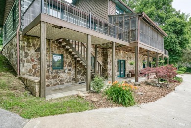 The essence of Tennessee Living! Honest Abe Log Home perched on on Hidden Valley Golf and Country Club in Tennessee - for sale on GolfHomes.com, golf home, golf lot