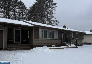 Beautiful home nestled on just over half an acre.  One level on Eveleth Municipal Golf Course in Minnesota - for sale on GolfHomes.com, golf home, golf lot