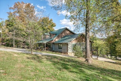 The essence of Tennessee Living! Honest Abe Log Home perched on on Hidden Valley Golf and Country Club in Tennessee - for sale on GolfHomes.com, golf home, golf lot