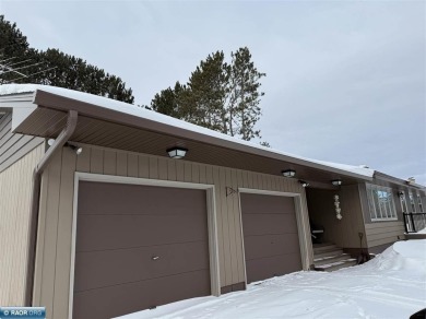 Beautiful home nestled on just over half an acre.  One level on Eveleth Municipal Golf Course in Minnesota - for sale on GolfHomes.com, golf home, golf lot