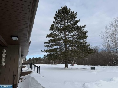 Beautiful home nestled on just over half an acre.  One level on Eveleth Municipal Golf Course in Minnesota - for sale on GolfHomes.com, golf home, golf lot