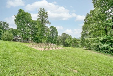 The essence of Tennessee Living! Honest Abe Log Home perched on on Hidden Valley Golf and Country Club in Tennessee - for sale on GolfHomes.com, golf home, golf lot