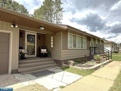 Beautiful home nestled on just over half an acre, only one on Eveleth Municipal Golf Course in Minnesota - for sale on GolfHomes.com, golf home, golf lot