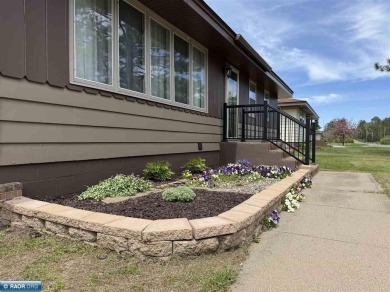 Beautiful home nestled on just over half an acre, only one on Eveleth Municipal Golf Course in Minnesota - for sale on GolfHomes.com, golf home, golf lot