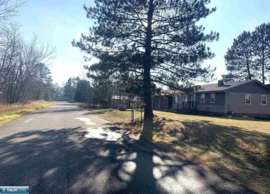 Beautiful home nestled on just over half an acre, only one on Eveleth Municipal Golf Course in Minnesota - for sale on GolfHomes.com, golf home, golf lot