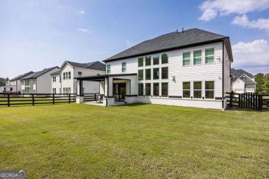 Welcome home to this executive home built by the Toll Brothers on Capital City Club Crabapple in Georgia - for sale on GolfHomes.com, golf home, golf lot