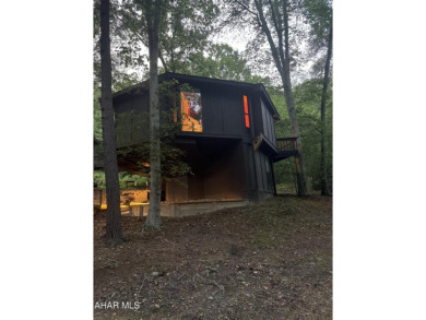 Everyone loves these Unique Homes, this one has you feeling like on Bedford Springs Golf Course in Pennsylvania - for sale on GolfHomes.com, golf home, golf lot