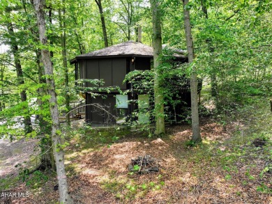 Everyone loves these Unique Homes, this one has you feeling like on Bedford Springs Golf Course in Pennsylvania - for sale on GolfHomes.com, golf home, golf lot