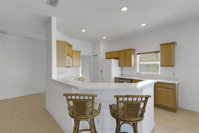 This lovely turnkey furnished maintenance free villa is move-in on River Strand Golf and Country Club At Heritage Harbour  in Florida - for sale on GolfHomes.com, golf home, golf lot