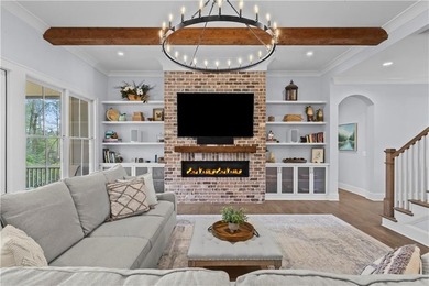 Welcome to 590 Ridgewater Drive, where thoughtful design on Indian Hills Country Club in Georgia - for sale on GolfHomes.com, golf home, golf lot